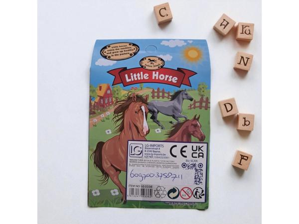 Little horse speelpaard zwart grijs gevlekt bruin haar