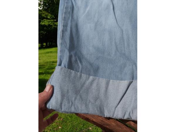 wijde jeans driekwart lang met omslagpijp lichtblauw 32 M/L
