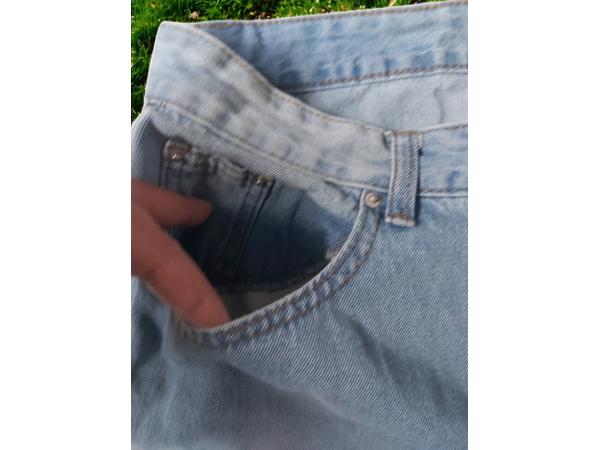 wijde jeans driekwart lang met omslagpijp lichtblauw 32 M/L